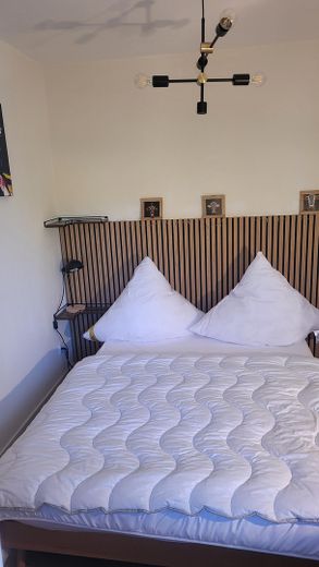 2-Zimmer-Maisonettewohnung mit Balkon – Schlafzimmer