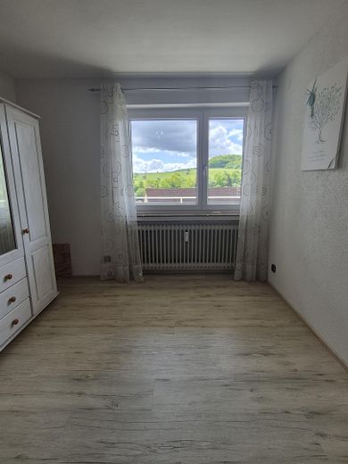 Außergewöhnliches Mehrfamilienhaus mit Aussicht und Ausblick – Schlafen / Büro EG