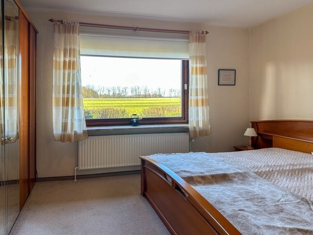 Ihr neues Zuhause: Großzügiges Einfamilienhaus mit Wiesenblick in Tellingstedt – Zimmer 2 EG