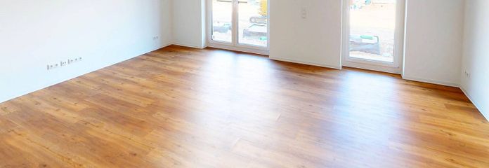 Hell und modern: Große 4-Zimmer-Wohnung mit EBK, 2 BÄDERN und BALKON im Neubauquartier FIELD 4 – Ansicht I: Wohn- und Esszimme…