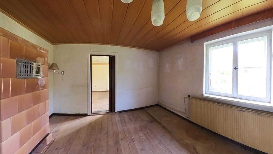 12 Zimmer | 164 m² | Doppelhaushälfte mit Entwicklungspotenzial nahe der Müritz- provisionsfrei – Wohnzimmer EG zum Schlafzimmer