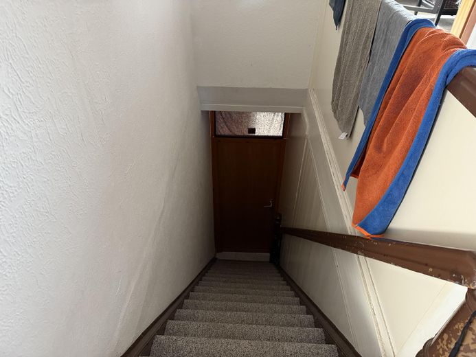 Treppe zur Wohnung oben