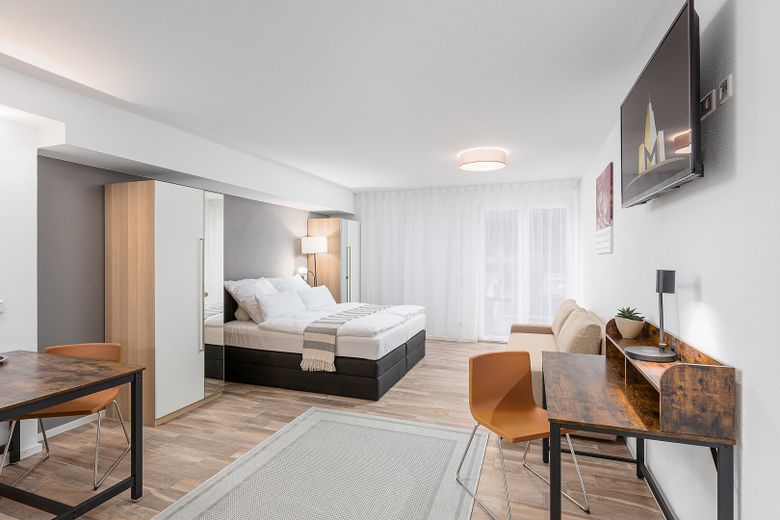 Neubau: vollmöblierte Businessapartments mit Panoramablick – Apartment 3 Wohnbereich