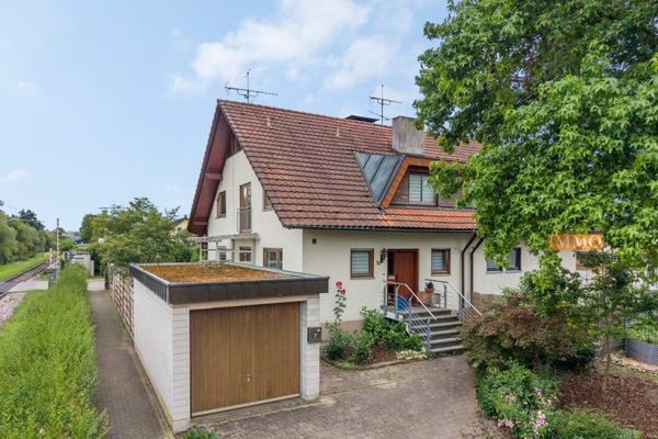IMMORath.de - Doppelhaushälfte mit Einliegerwohnung und Garage