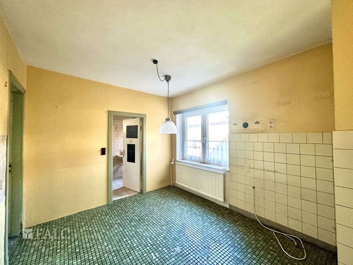 Einfamilienhaus mit Einliegerwohnung und Baugrundstück in zentraler Lage von Himmelpforten – Küche EG