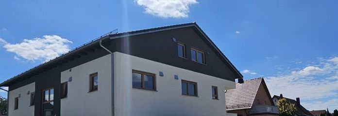 Erstbezug | Charmante 4-Zi.-DG-Wohnung mit Loggia, Einbauküche & KfW 40 QNG