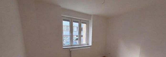 Sanierte 3 Zimmer Wohnung in der Südstadt – Wohnzimmer KI Boden