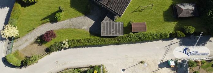 Großzügiges Baugrundstück mit Altbestand & Bergblick in begehrter Lage von Rimsting