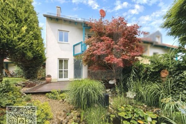 Verzorgd eindhuis in een rij met Feng-Shui-tuin op een toplocatie in Oberbeuren