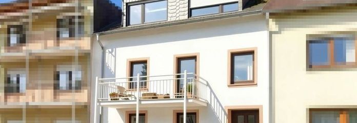 Trier-Filsch: Reihenmittelhaus als 3-FH mit zwei Balkonen, zwei Garagen & zwei PKW-Außenstellplätzen
