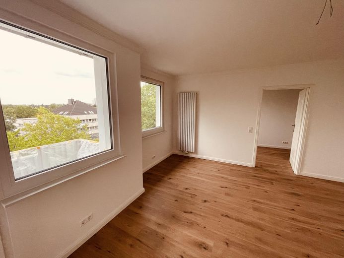 3-Zimmer-Wohntraum am Mittellandkanal – saniert, bezugsbereit & mit Weitblick – Wohnzimmer 