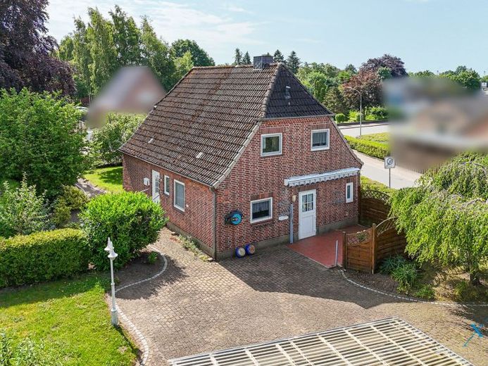Solides Einfamilienhaus in Großenwiehe mit Garten, Carport und praktischer Raumaufteilung – Foto 1