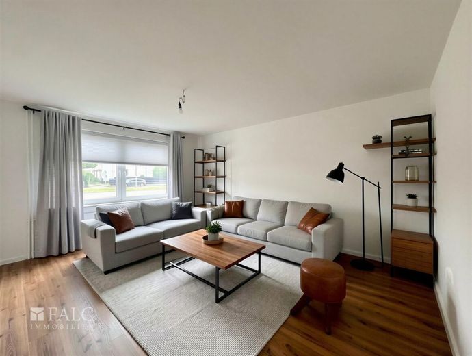 Attraktive Erdgeschosswohnung in Herten, Erstbezug nach umfassender Sanierung – Wohnzimmer KI