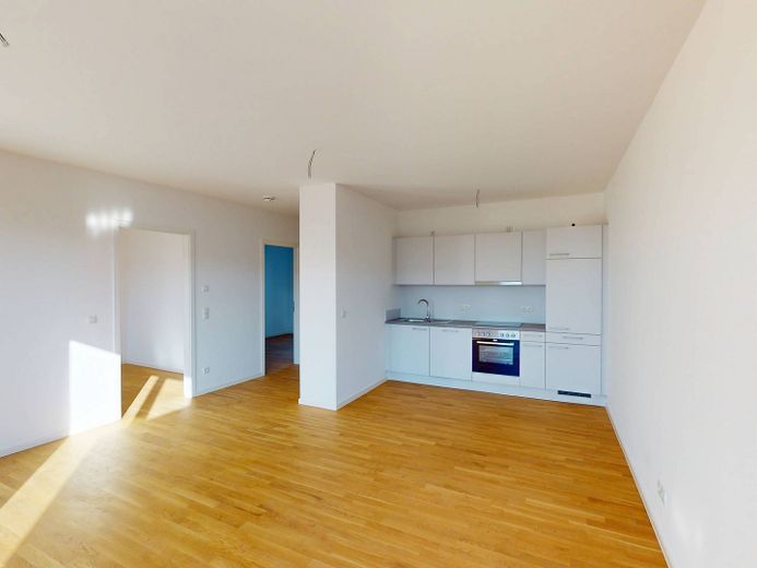 Splendido appartamento di 3 locali con cucina a vista nel nuovo quartiere residenziale "Ferdinands Garden" – Ansicht II: Wohn- und Esszimm…