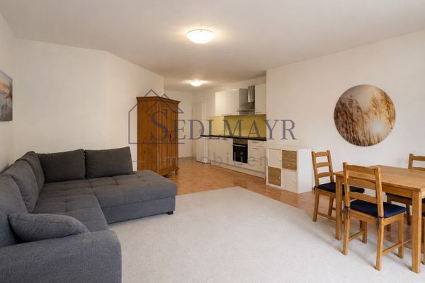 VERKAUF: Helles Souterrain-Apartment mit eigener Terrasse!
