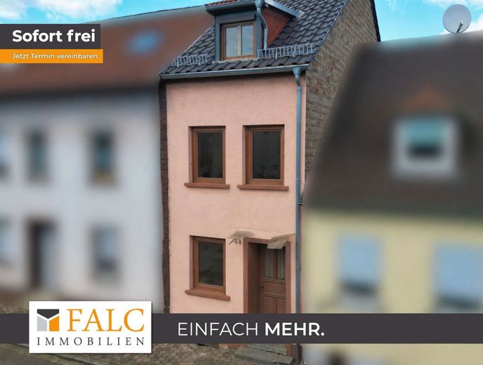 Charmantes Reihenmittelhaus mit Garten in zentraler Lage – Außenansicht
