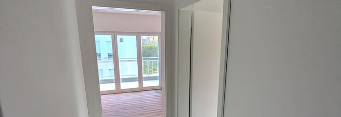 Moderne Wohlfühloase: Helle 3- bis 4-Zimmer-Obergeschosswohnung mit Balkon als Erstbezug