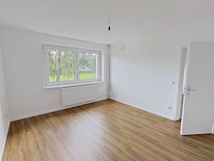 Cocina equipada y baño con bañera: moderno apartamento de 3 habitaciones en el sur de Flensburg – Ansicht I: Schlafzimmer I