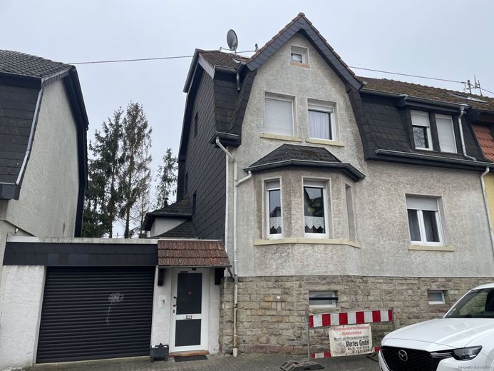 Modernisiertes Einfamilienhaus in idyllischer und ruhiger Lage von Dudweiler – Titelbild