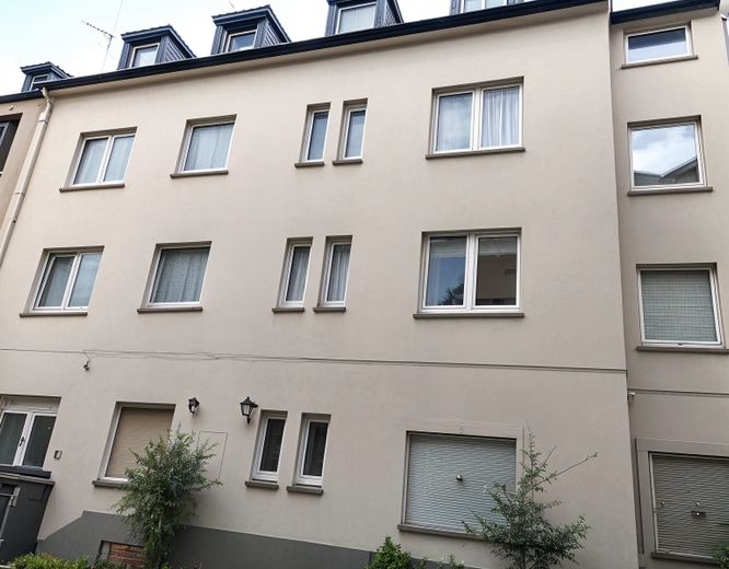 Wohn- und Geschäftshaus in Duisburg-Mittel-Meiderich - voll vermietet &amp; renditestark mit 5WE und 2GE – Fassade hinten