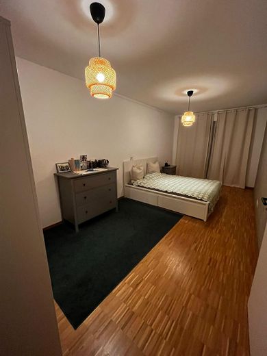 Modern 2-room apartment with underground parking space – Schlafzimmer