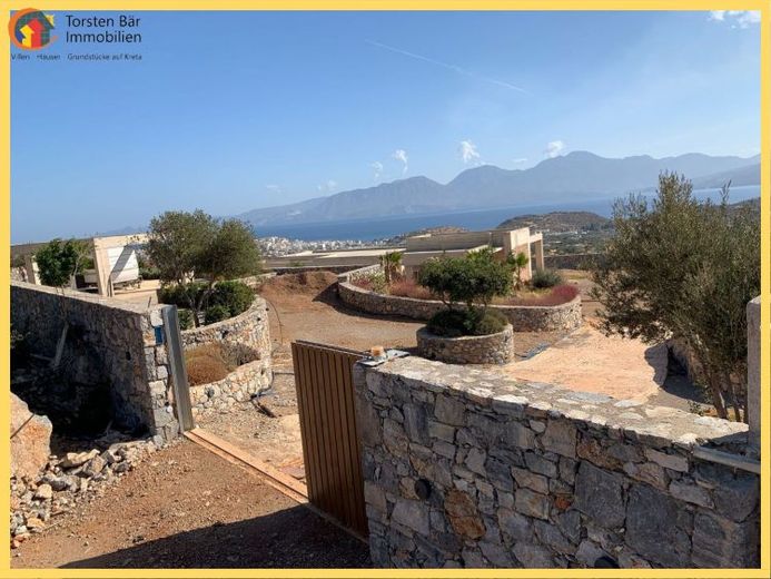 Kreta, Ag. Nikolaos Wunderschönes Grundstück mit neu errichtetem Rohbau – Foto 1