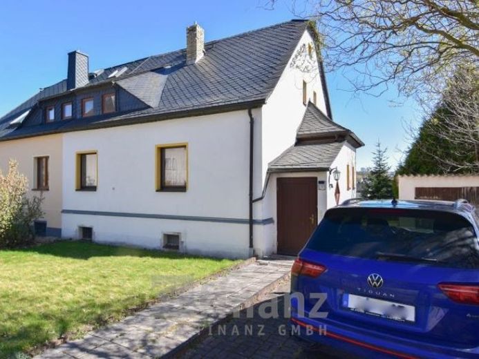 Doppelhaushälfte in Oelsnitz/Erzgeb. kaufen: 124 m² Wohnfläche, schöner Garten, Garage und Keller – Foto 1