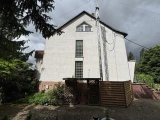 Charmant vrijstaand huis met balkon, garage en tuin – uw nieuwe thuis in Prausitz – Seitenansicht