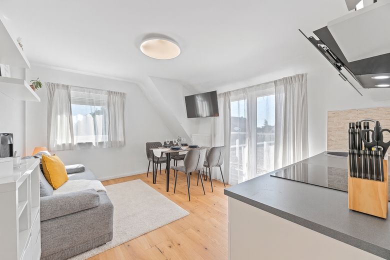 Wohnzimmer mit Küche