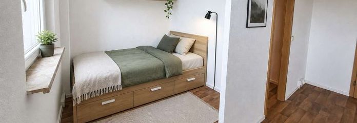 Compacte, chaleureuse, intelligemment agencée – appartement 1 pièce avec alcôve nuit + balcon à partir d’octobre 2026