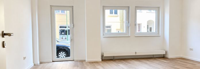 Erstbezug nach Umbau – moderne barrierearme 3-Zimmer-Wohnung in Kierspe – Wohnzimmer