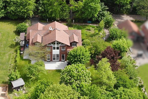 Representative residential and commercial property with a privacy-screened garden with >300m² total area