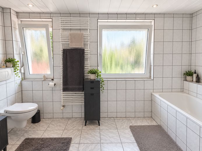 Charmante twee-onder-een-kapwoning met tuin, terras en volop ruimte om zich prettig te voelen – Badezimmer