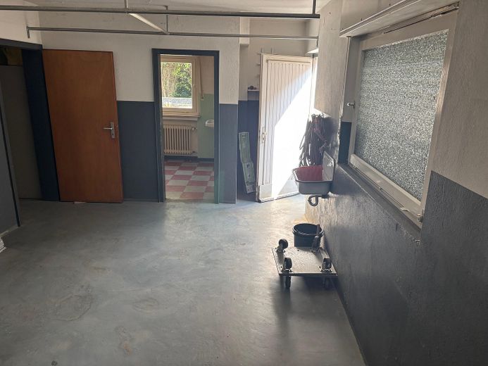 Bungalow mit großer Doppelgarage in ruhiger, zentraler Lage auf tollem Grundstück – Garage klein