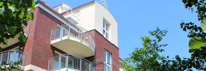 wenige Schritte zum Sandstrand: Maritimes Wohnen in Duhnen - Wohnung m. Deichblick u. Sonnenbalkon