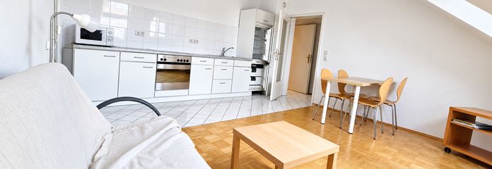 Mooie, gedeeltelijk gemeubileerde 2-kamerwoning op een centrale, rustige locatie – Wohnzimmer #1