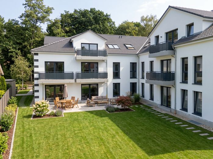 Ihre ruhige Terrassenwohnung mit Garten zum Hinterhof – Hinteransicht - Blick Terrasse