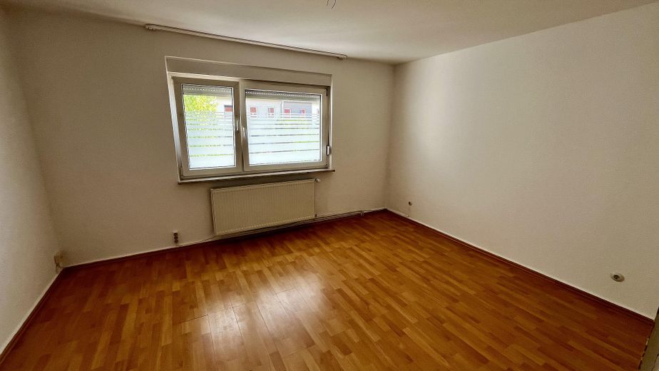 1.OG Zimmer links zum Garten