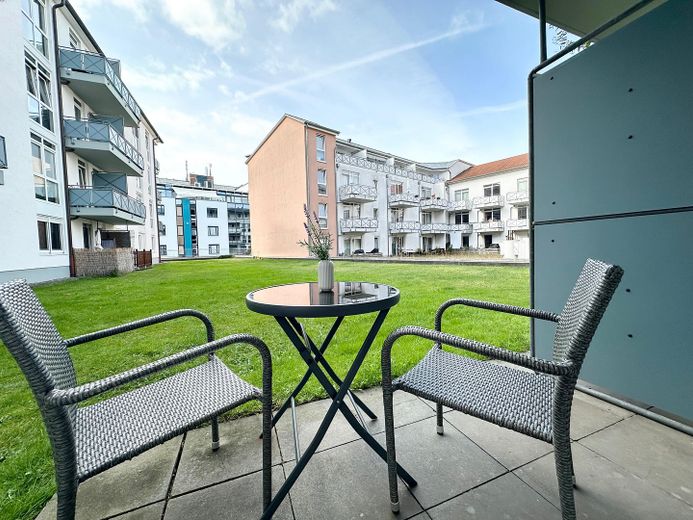 Frisch renovierte 1‑Zimmer-Wohnung mit Einbauküche und ruhiger Innenhofterrasse – Terrasse