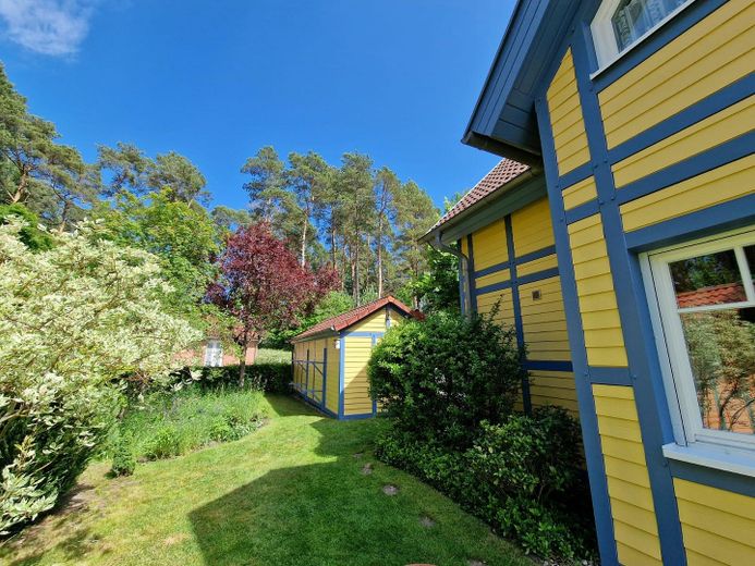 Casa de vacaciones con embarcadero propio en Hafendorf Rheinsberg – Gartenblick Richtung Uferstr.