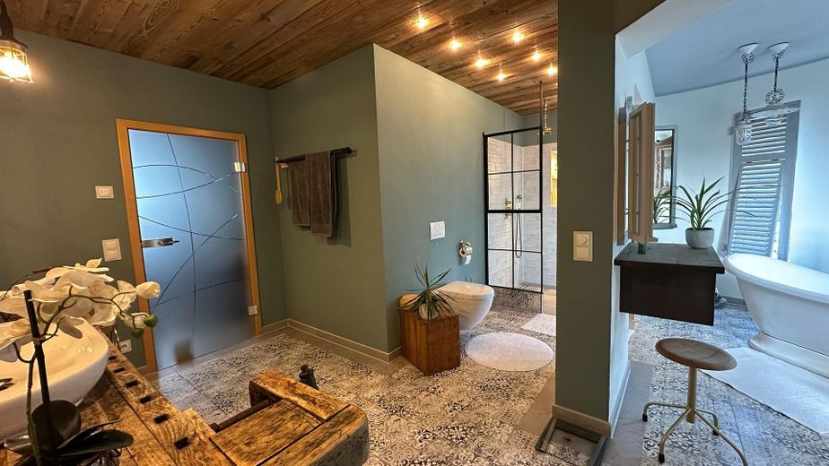 Straordinaria casa unifamiliare moderna con doppio garage – Badezimmer 1. OG