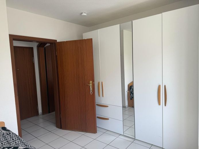 Naturnahe, idyllische Terassen/Gartenwohnung in ruhiger Weinberglage – Schlafzimmer
