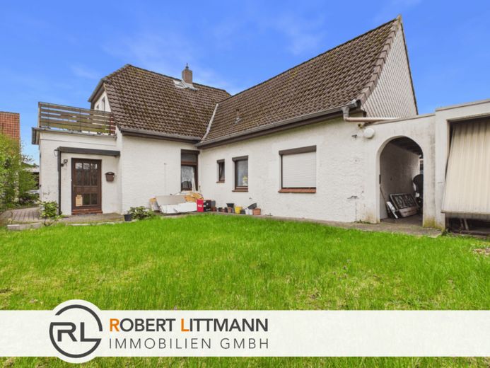 Solide kapitaalinvestering: verhuurde eengezinswoning in Rotenburg met 6 kamers & tuin – Foto 1