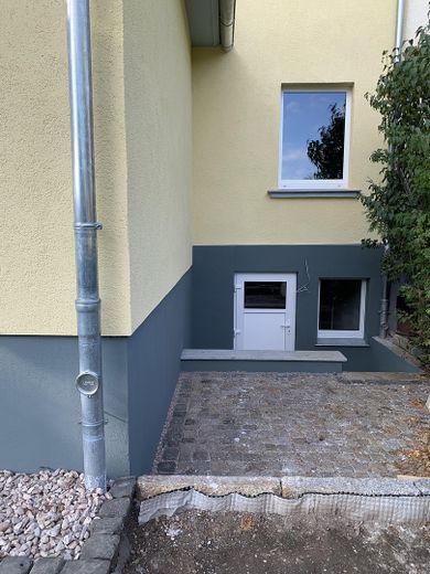 Familienfreundliches Einfamilienhaus in beliebter ruhiger Lage - Erstbezug- – Kellerausgang in den Garten
