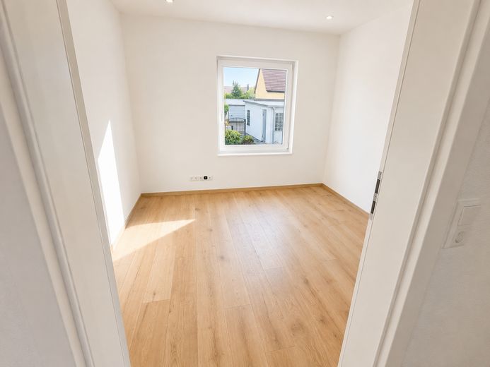 Sanierte ein Familienhaus – Zimmer 1 EG