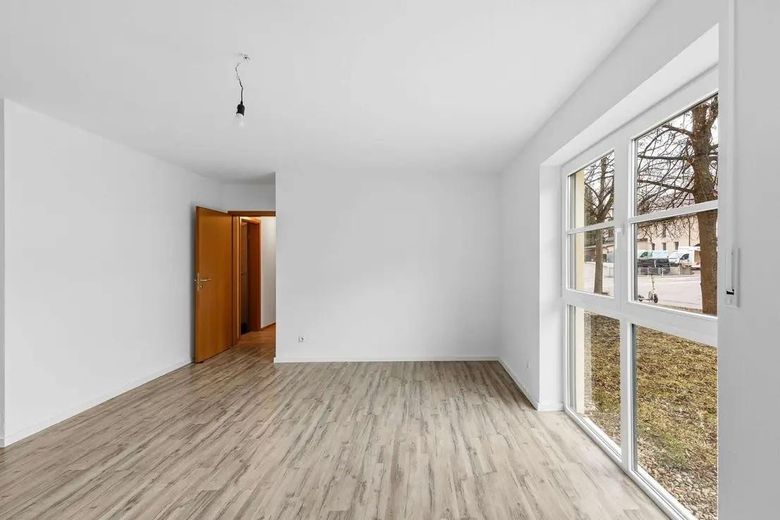 Appartamento di 2 locali appena ristrutturato con terrazza in posizione top al Galgenberg – Wohnbereich