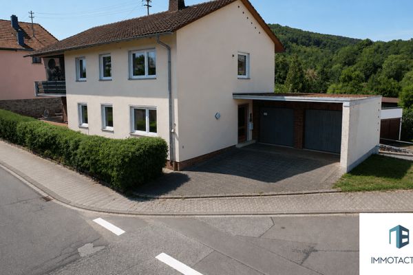 Voll vermietetes 3-Familienhaus mit 3 Garagen, Garten & weiterem Mietpotenzial