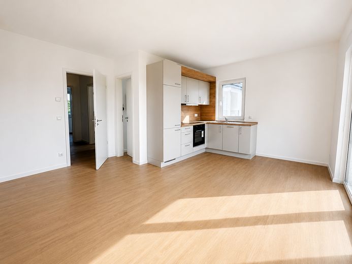 Erstbezug im Neubau! Moderne 2-Zimmer Wohnung mit QNG-Plus Siegel und Einbauküche! – Wohnzimmer