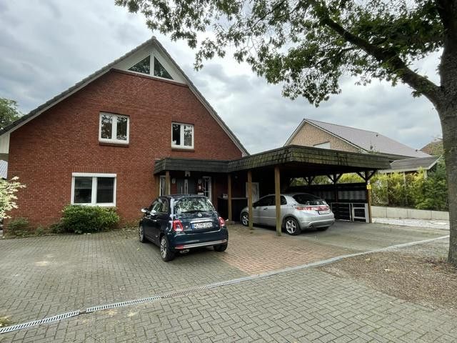 Mieszkanie na parterze z ogrodem w Scharmbeck – Hausansicht 