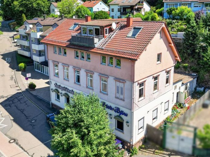 Interessantes Wohn- und Geschäftshaus – Foto 1